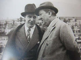 Ettore Bugatti (right) and his son Jean discuss race tactics