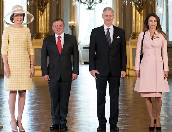 King Philippe and Queen Mathilde of Belgium welcome King Abdullah and Queen Rania of Jordan during an official welcome ceremony at the Royal Palace in Brussels