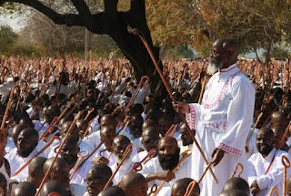 St Noah Taguta leads members of the Johane Marange Apostolic Sect in song during a Passover Conference at Mafararikwa July 2015