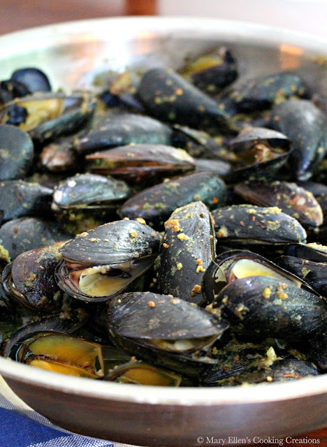 Mussels roasted in an almond butter with garlic, lemon and wine. Easy yet impressive appetizer or meal. Perfect with wine and crusty bread. Recipe via Fore Street, Portland, Maine.