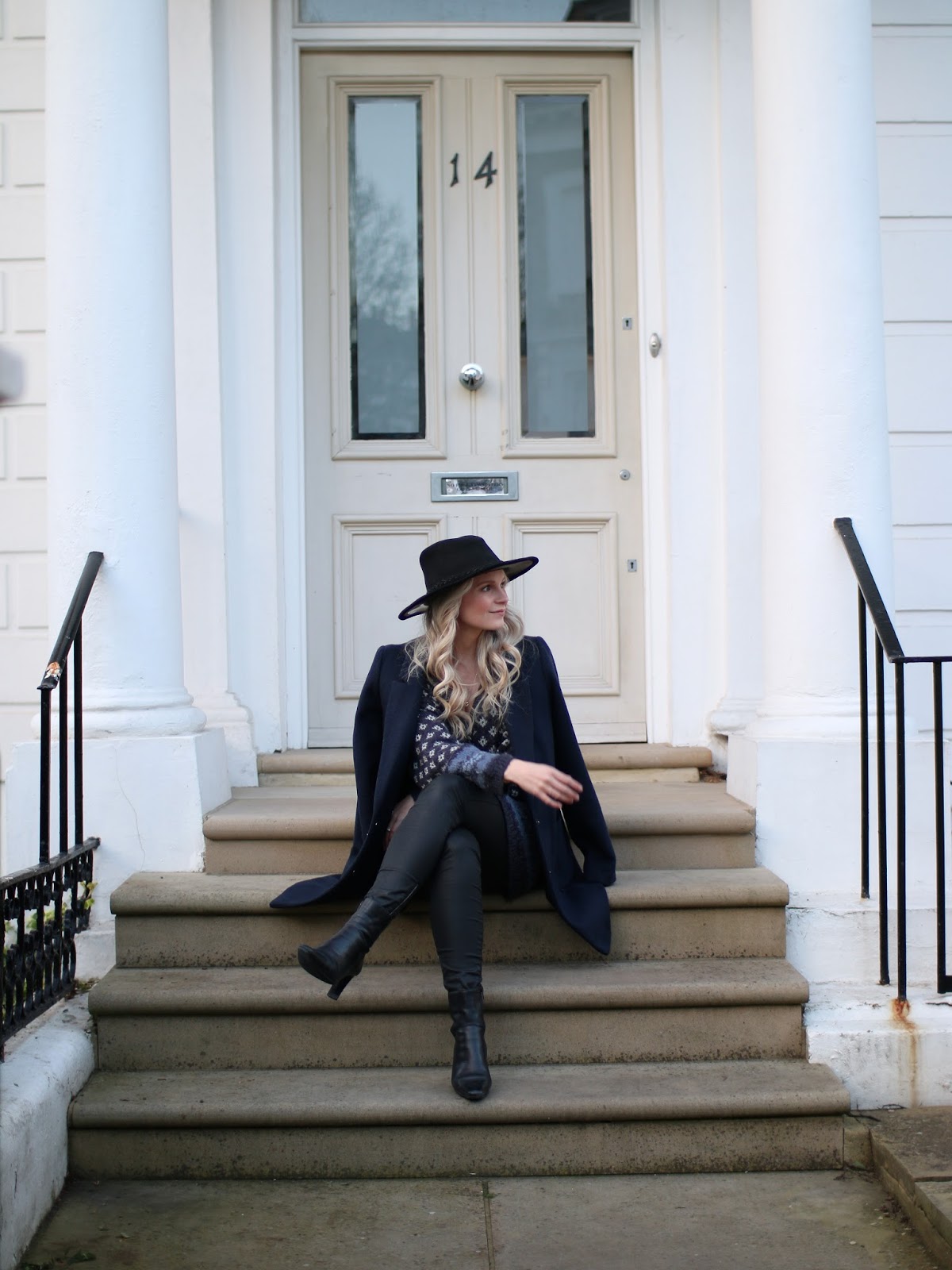 sitting on a notting hill door step 