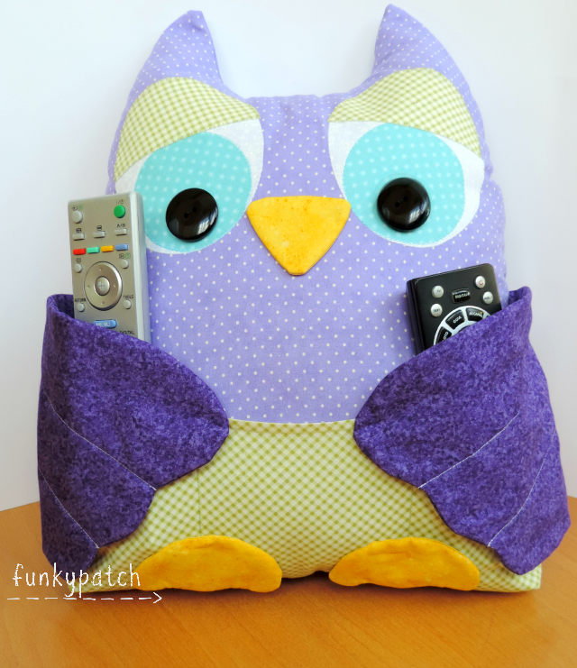 Búho en tela porta mando television