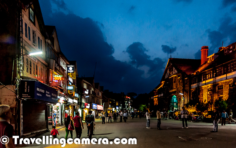 Saturday Evenings and Mall Road in Shimla have a very strong connection. During my sabbatical, I was there in Shimla on Saturday and planned to have a round of Mall Road as well. This Photo Journey shares some moments spent around Mall Road on Saturday Evening and the associated memories.During my graduation from Himachal Pradesh University, we used to stay at Shangati, which is around 6 kilometers from Mall Road, Shimla. And every saturday we used to walk from Shangti or summerhill to Mall Road via Indian Institute of Advanced Studies, Chaura Maidaan & Vidhan Sabha.It was part of our default routine to visit Mall Road to take 4-6 rounds of Mall Road & Ridge and have quick-snacks at Chachu's Tea shop on other end of the Mall Road. Friends who had girl-friends, they used to roam around other places like Top Breads, Barista or other fancy places to eat :).Why Saturday is so special. Basically most of the folks of shimla used to come to Mall Road during evening. All School & College Kids, Office working people etc. Don't know why but it has become a strong trend in Shimla to visit Mall Road on Saturday Evening. During the recent visit, we explored some of the new cafes and really loved the Wake & Bake Cafe, which is just in front of Shimla Town-Hall on Mall Road. Above photograph shows one of the art-work on walls of Wake & Bake Cafe.We met a gentleman who shared different stories about Shimla and some interesting observations on Mall Road which can't be shared on this blog. Aneesh encouraged him to have some detailed discussion about army and Indian politics. After all those conversations he also tried to tell Aneesh about his future and related stuff. It seems, this gentleman is found on Mall road every evening.Here is a photograph showingone portion of Gaiety Theatre building which is being used by Himachal police department. It's a beautiful building in front of Town-Hall Shimla.A beautiful night view of Mall Road Shimla - Town-Hall building on right. Most of the shooting on Kareeb movie has happened in this region. Town-Hall which is on right was shown as hospital and there is Fire-Station on left which was shown as laundry where Bobby Deol used to stay. Anyways, many other movies are shot around these beautiful buildings on Mall Road of Shimla. Most of the shops/buildings on Mall Road have old architecture and the ones which are new have been designed to match with overall feel on the town. Most of the old buildings are from British era. The beautiful architecture if the one of the reasons which make this city beautiful.Fruit vendor near Willow Bank building who welcomed us with plates full of fresh fruits - Cherries, Kiwi & Strawberries. Probably he chose best of the lot for us. Every piece was amazingly tasty. He is a big fan of Aneesh's bike stunts and an old friend when Aneesh used to live in Shimla.