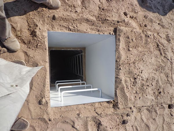 These shelters are built by Atlas Survival Shelters. - See This Hidden Trap Door In The Ground? Just Wait Till You See What’s Down There… WHOA. These shelters are built by Atlas Survival Shelters. - See This Hidden Trap Door In The Ground? Just Wait Till You See What’s Down There… WHOA.