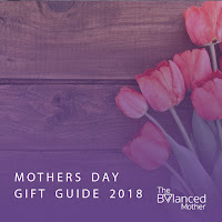 picture of flowers on a table with text that reads mothers day gift guide