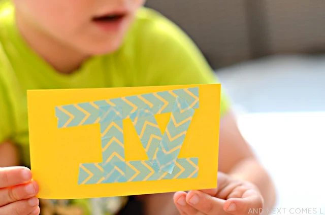 Homemade Roman Numerals flashcards with washi tape - a fine motor math craft for kids from And Next Comes L