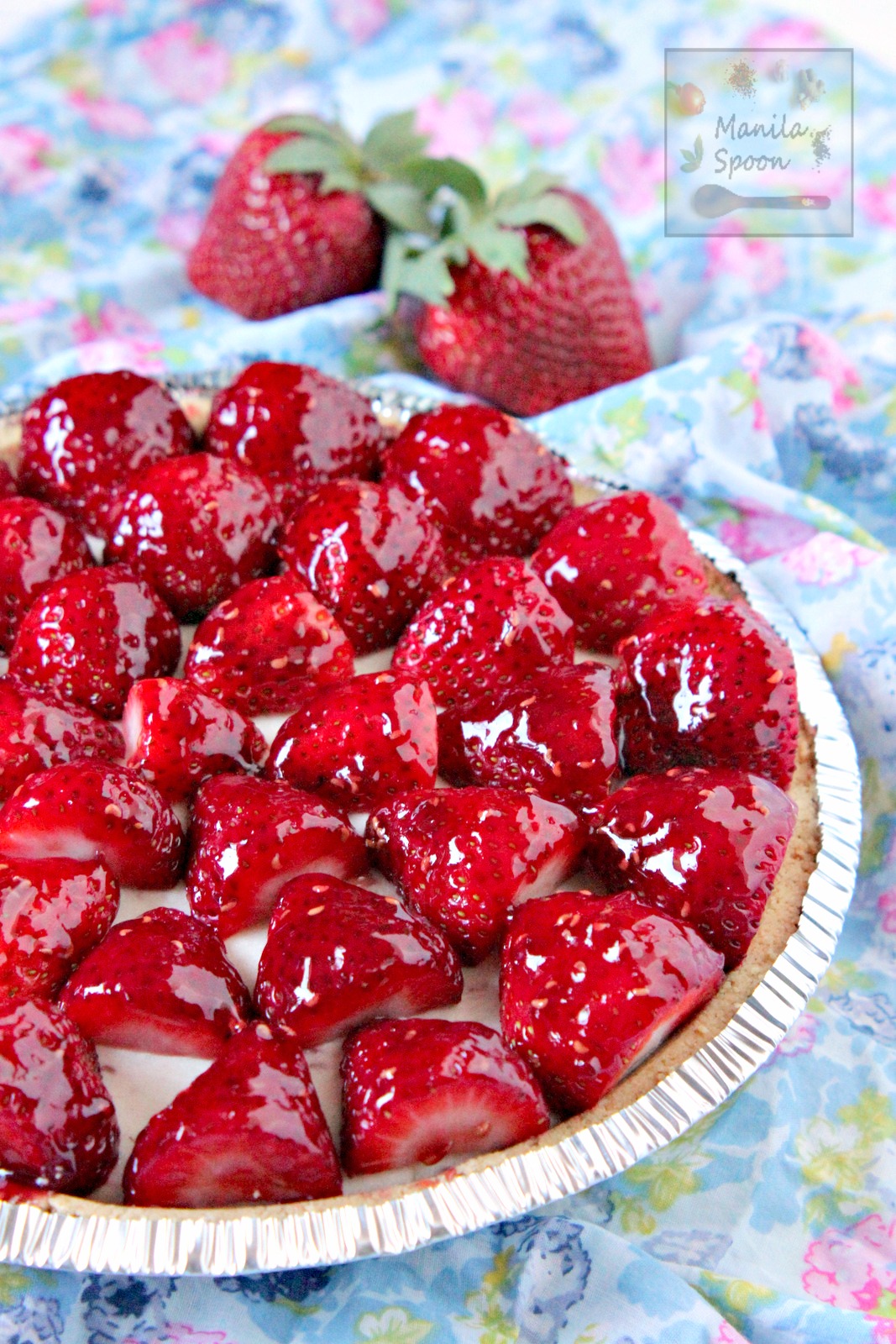 Glazed fresh and juicy strawberries and luscious white chocolate cheesecake make up this ultimate summer pie! NO BAKE, easy and delicious recipe that will make everyone happy! | manilaspoon.com