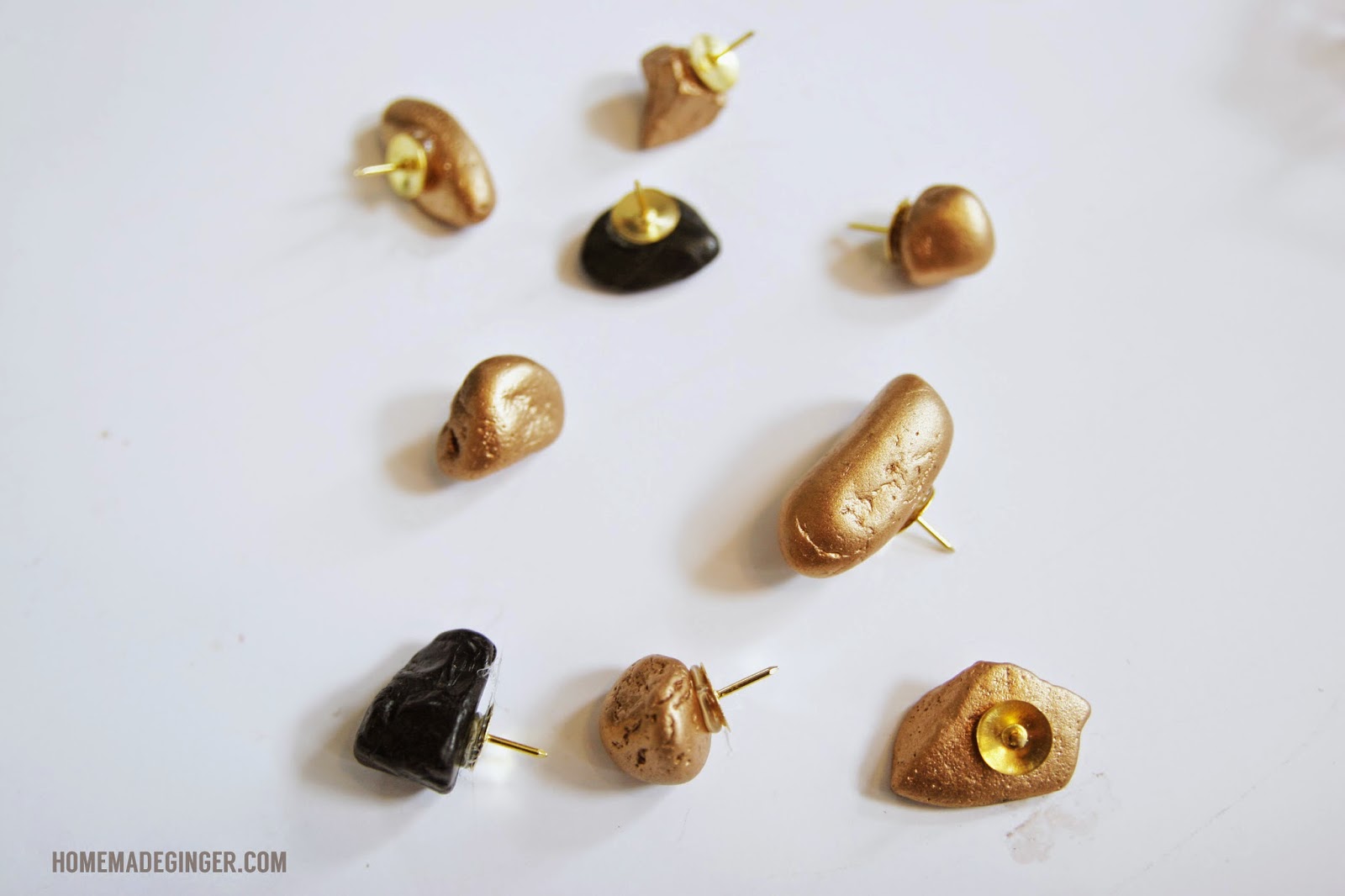 Metallic stone thumbtacks