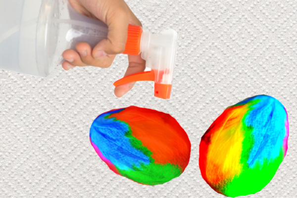 Tie-dye Easter eggs using food coloring and paper towels!  This decorating idea is great for kids of all ages, and the Easter eggs produced are absolutely stunning!  #tiedye #tiedyeeastereggs #tiedyeeggs #tiedyeeastereggsusingpapertowels #eastereggsdecorating #eastereggdecoratingfortoddlers #eastereggdyeideas #eastereggdecoratingforkids #eastereggsdiy #growingajeweledrose