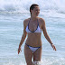 Immy Waterhouse Frolics in the Surf in a Wet White Bikini
