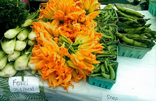 Squash and zucchini flowers are a common sight in African kitchens.