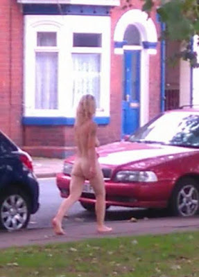 unnamed Naked blonde woman pictured strolling around town in broad daylight