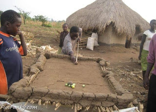 Jogar Bilhar em África