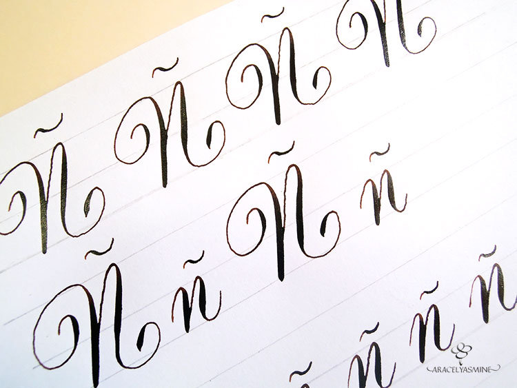 caligrafia copperplate letra enne abecedario ñ
