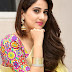 Beautiful Telugu TV Anchor Manjusha Stills In Transparent Yellow Saree