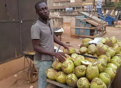 Meet the 27-year old university student that sells coconut for a living