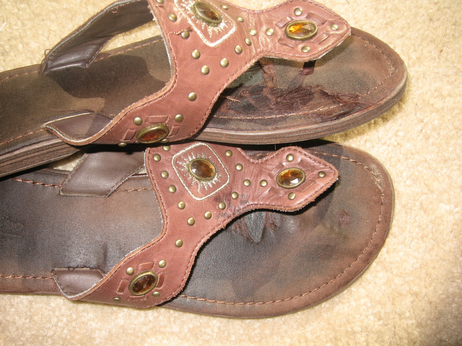 well worn trashed shoes