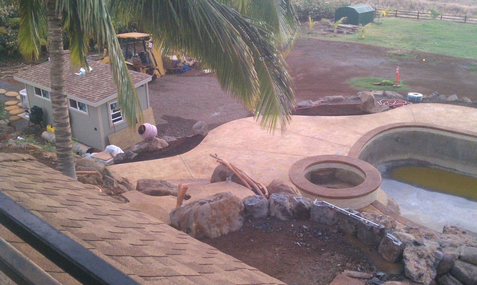 West Maui Estate Acid stained the concrete around the pool in a two