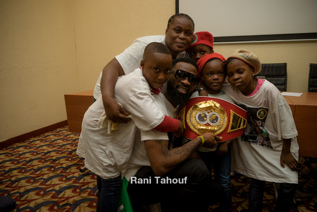  Photos of boxing champ Larry Ekundayo