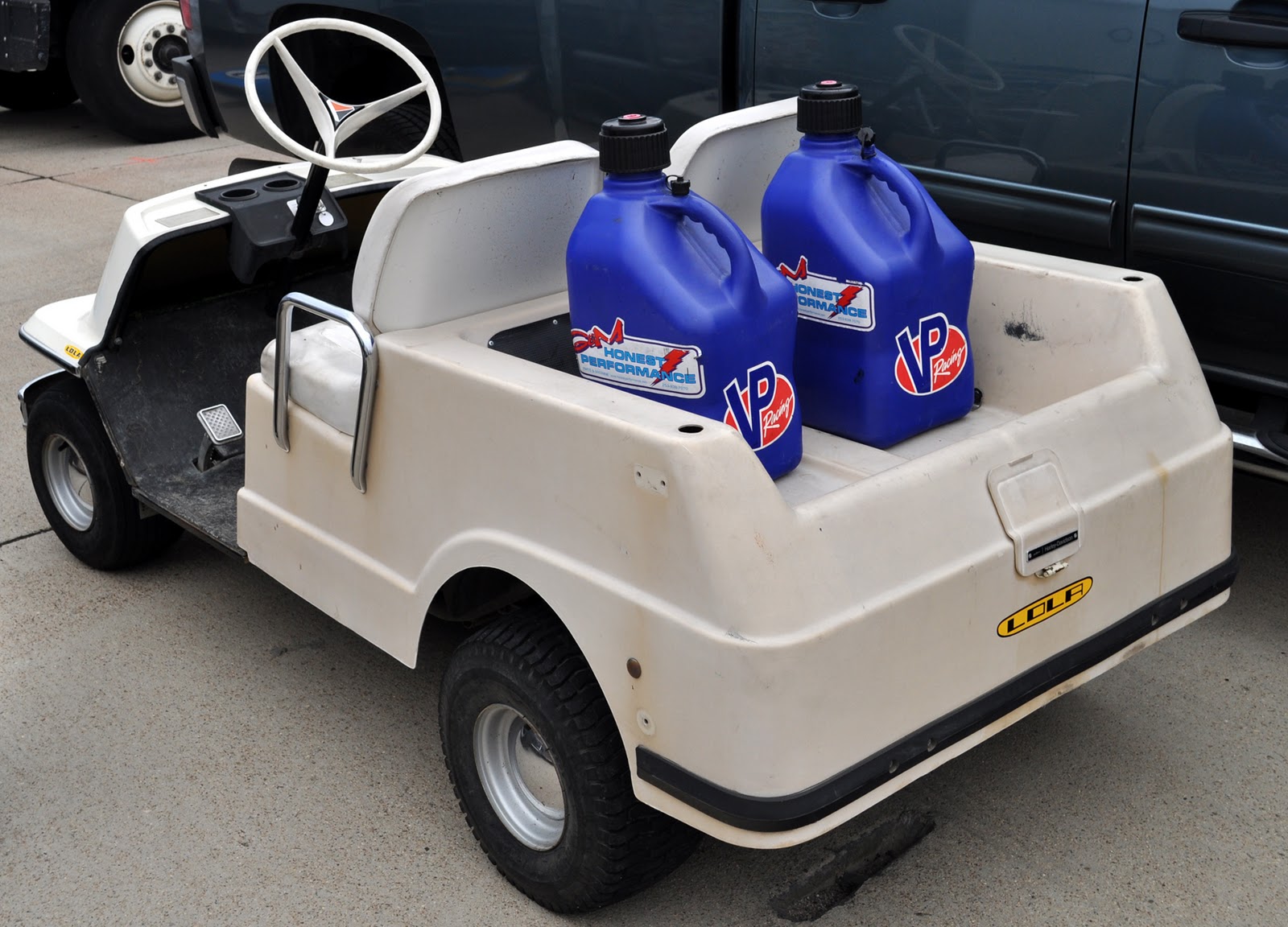 Just A Car Guy race car driver golf carts
