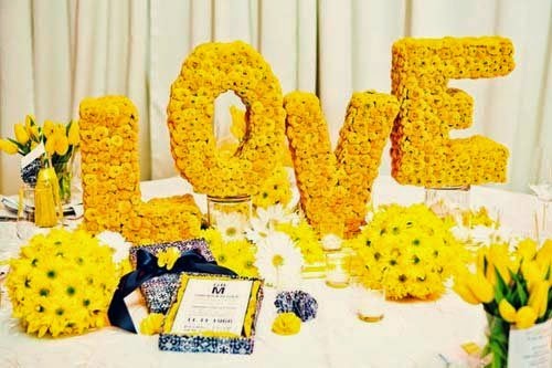 Wedding decoration ideas with yellow and black colors from Studio B Event Designs