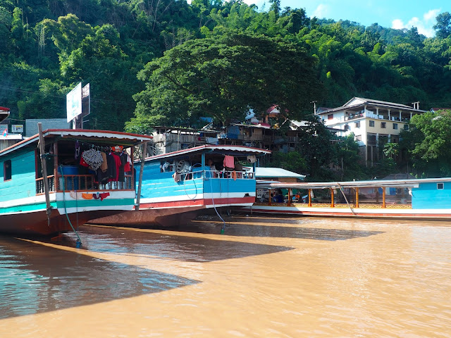 Boats in the Mekong river at Pak Beng, Laos
