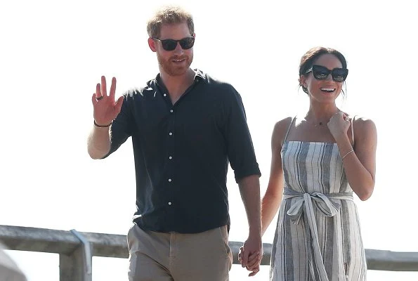 Meghan Markle wore Reformation Pineapple Dress and Sarah Flint Grear Lace Up Sandals. Adina Reyter three diamond amigos curve post earrings