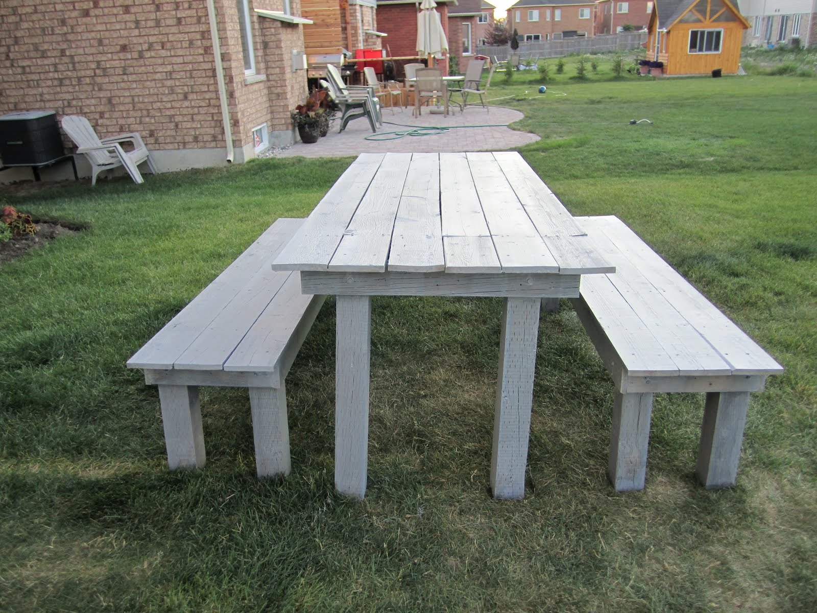 The Cosgrove Chronicles Patio Table from Old Fence Boards