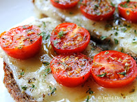 Wheat Five Grain Italian Toast With Broiled Garlic, Marmite, Cheese, Tomatoes, Olive Oil and Herbs