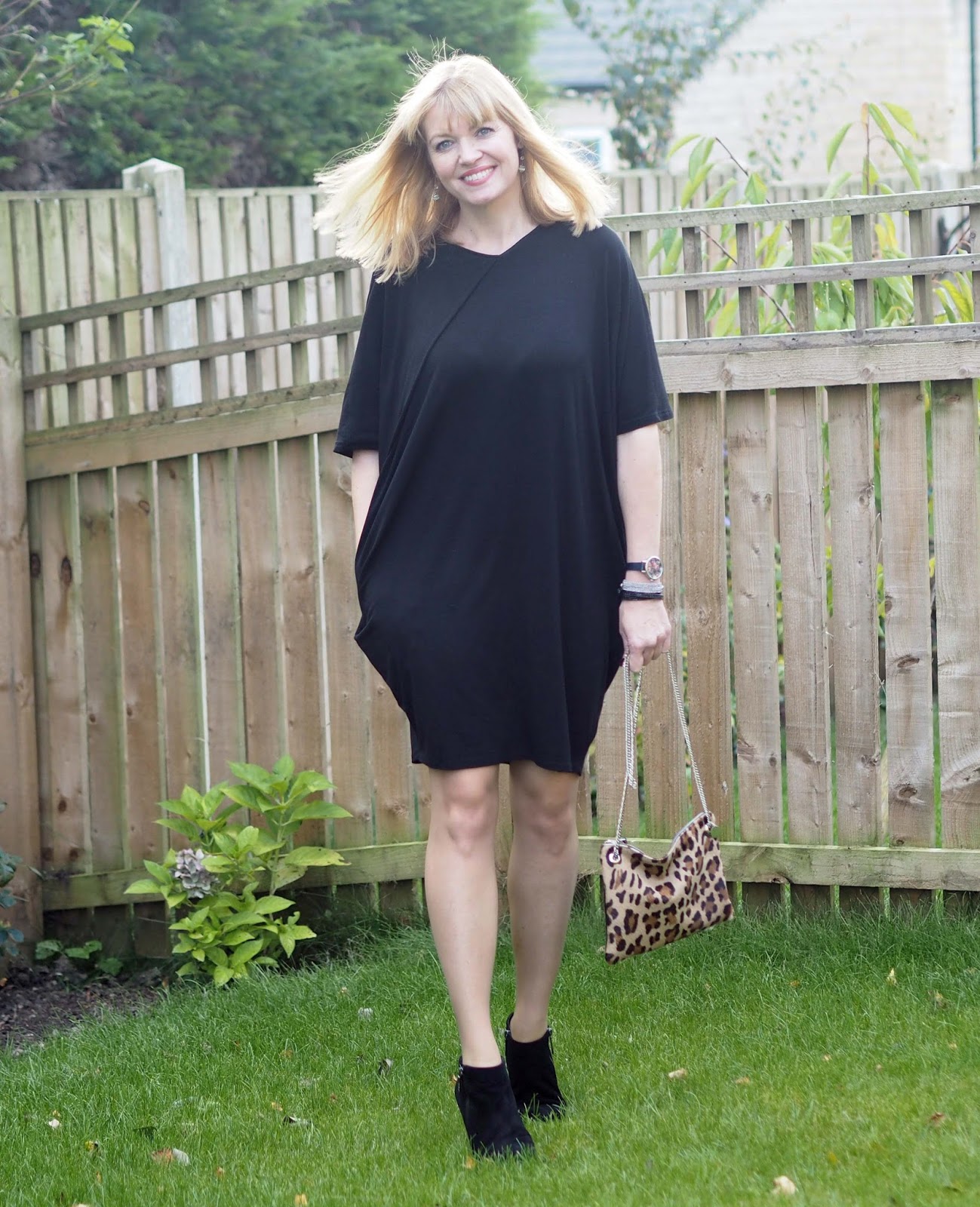 Black Cocoon Pocket dress, Ankle Boots and Printed Tights - What Lizzy Loves