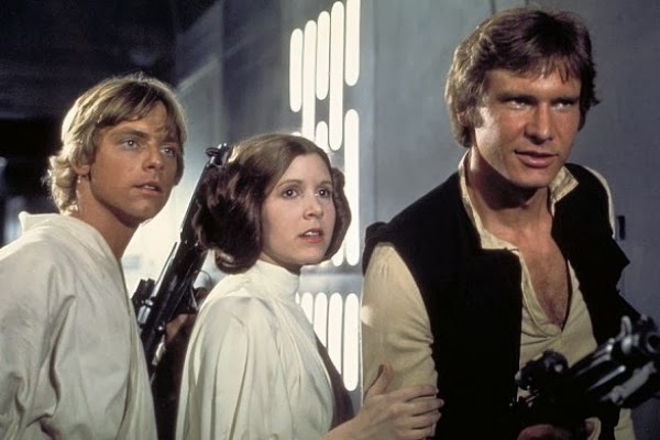 Mark Hamill, Carrie Fisher and Harrison Ford playing in Star Wars