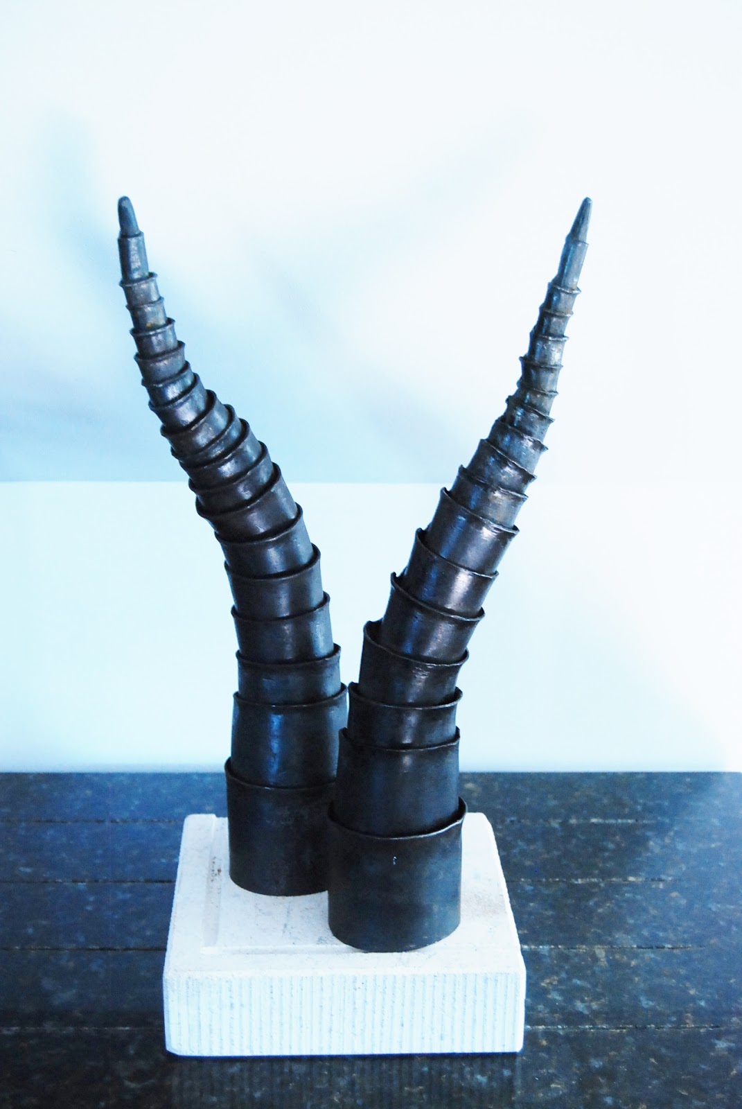 BURNING METAL ANIMAL HORNS