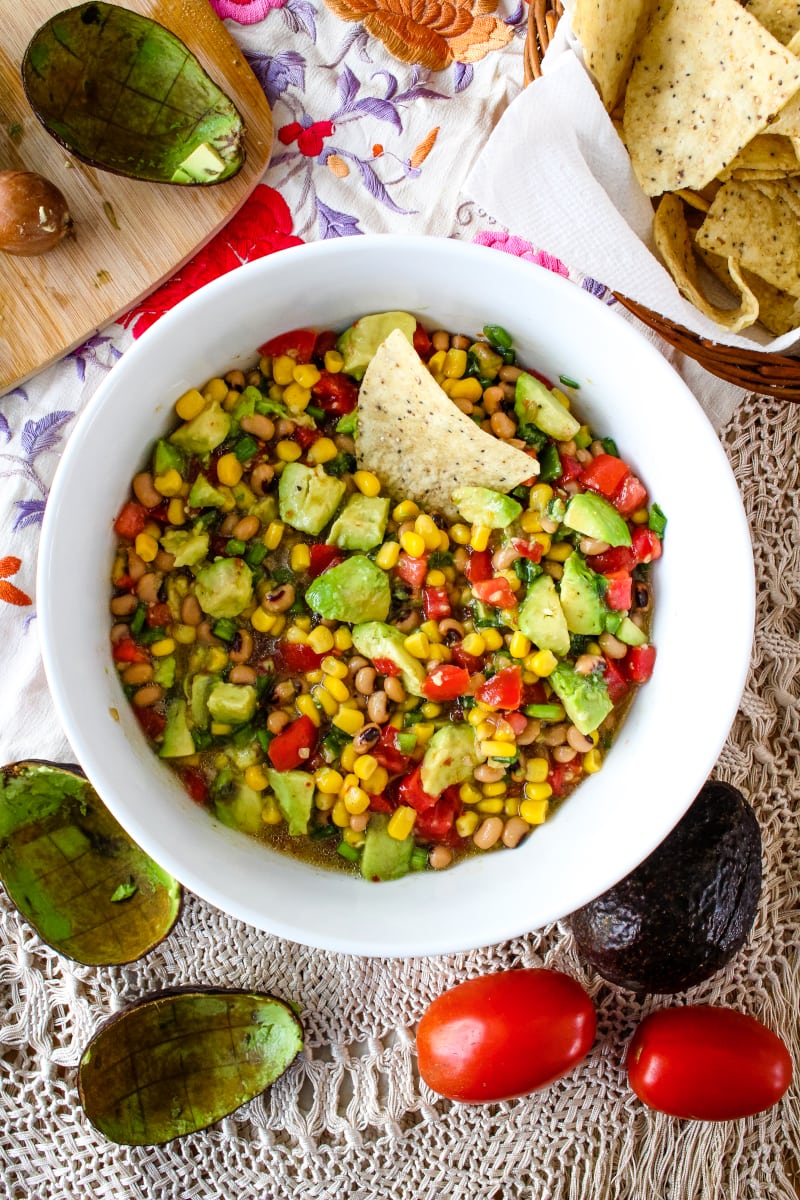 Avocado Texas Caviar | The Two Bite Club | #appetizer #diprecipes #avocado Avocado Texas Caviar is an easy to make appetizer that comes together in just minutes! It's perfect for parties and game day get-togethers! #appetizer #diprecipes #avocado