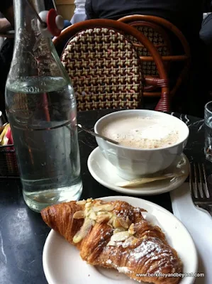 almond croissant and latte at Cafe de la Presse in San Francisco, California