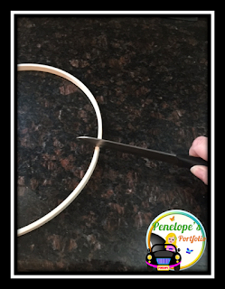 Cutting a craft loop in order to make a crayon clock