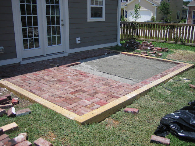 Replacing concrete patio with brick in double basket weave pattern for a cottage look and feel | The Lowcountry Lady