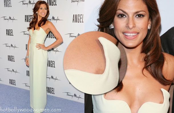 Eva Mendes wardrobe malfunction, with her nipple popping out.Eva Mendes&apo...