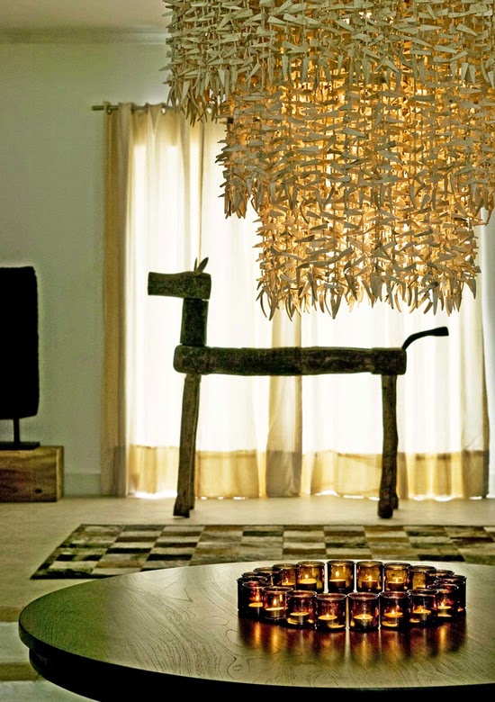 Safari Fusion blog | Light the way [part 2] | Amber glass tea lights and a spectacular grass chandelier at The Oyster Bay Hotel, Dar-es-Salaam Tanzania