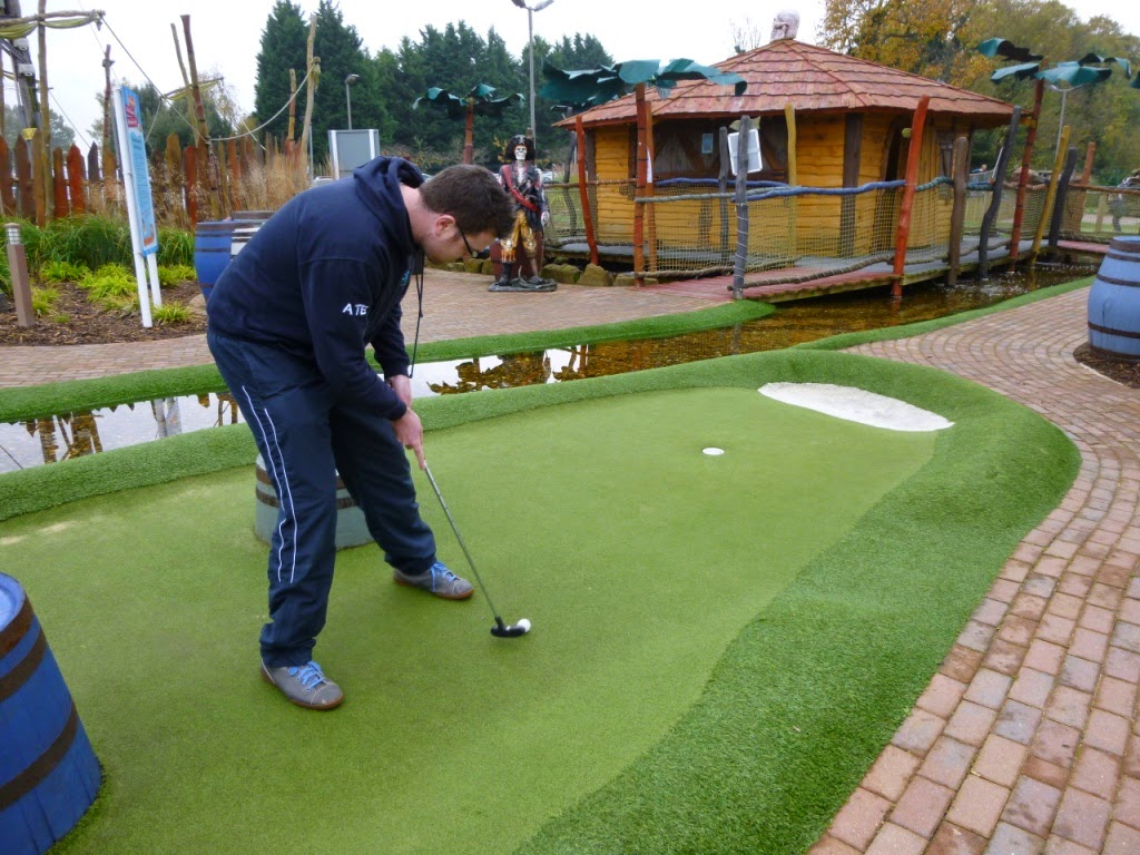 Oliver Florence putting during the Surrey Invitational Tournament round at Pirate Island Adventure Golf at Hoebridge Golf Centre in Woking Oliver Florence putting during the Surrey Invitational Tournament round at Pirate Island Adventure Golf at Hoebridge Golf Centre in Woking