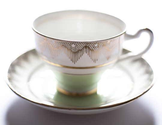 green and gold star vintage teacup