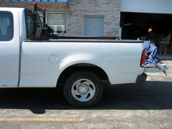Here's the white truck that transported our church pew to and from the restoration shop. 