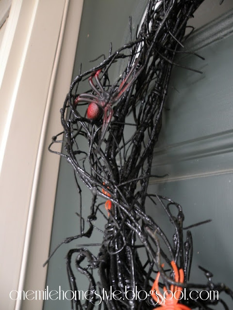 Plastic spiders on Halloween Wreath