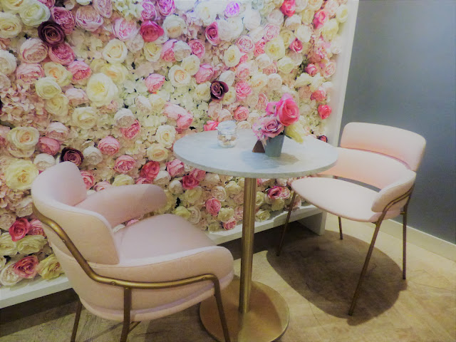 Pink flower wall at Elan Cafe, Park Lane, London