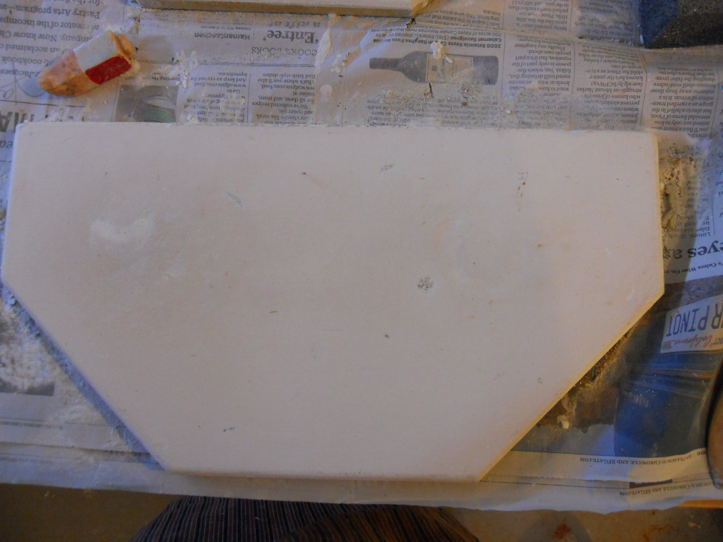 Scraping out a story about kiln shelves