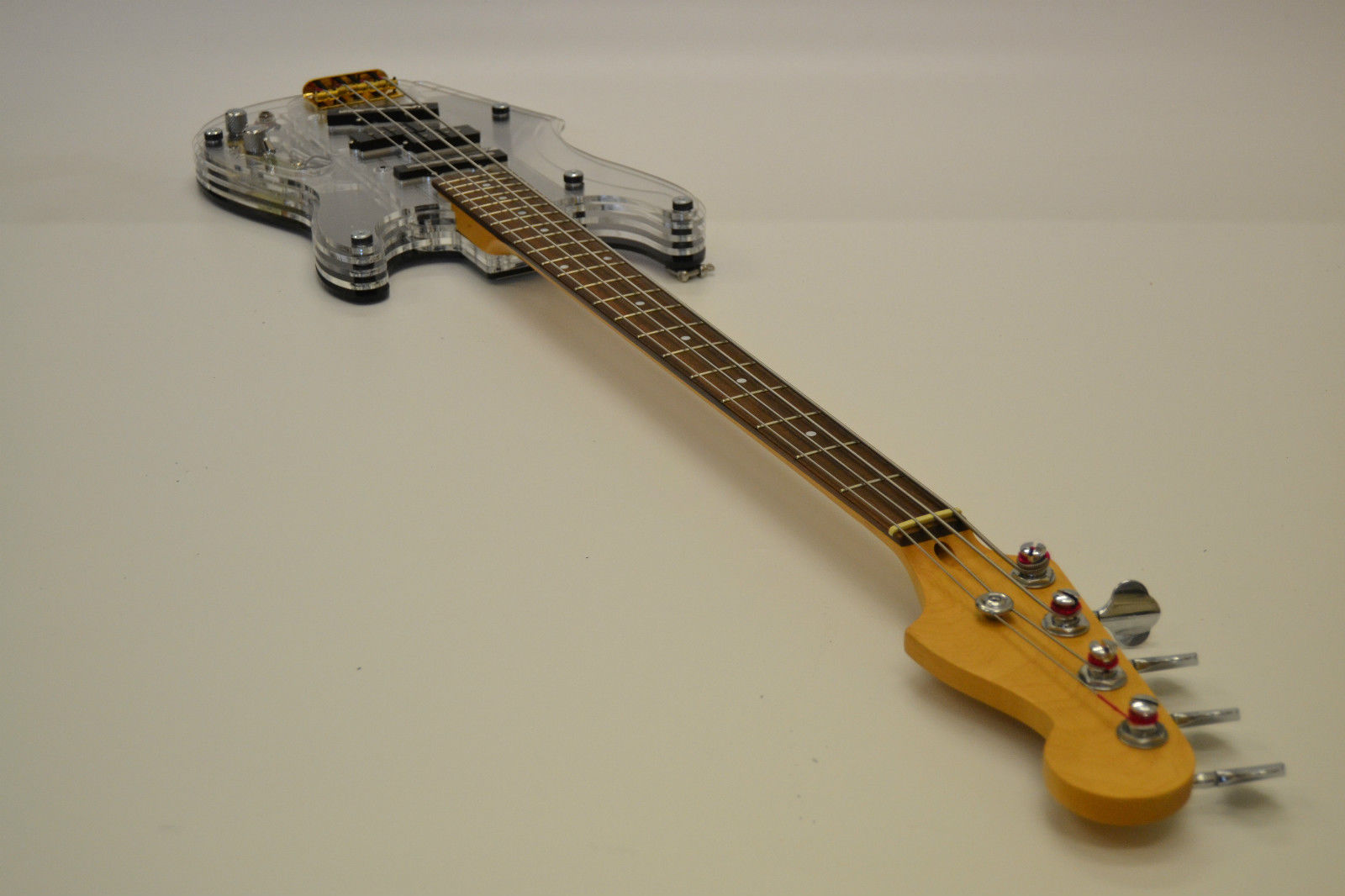 Guitar Blog Layer Guitars Acrylic bodied bass guitar