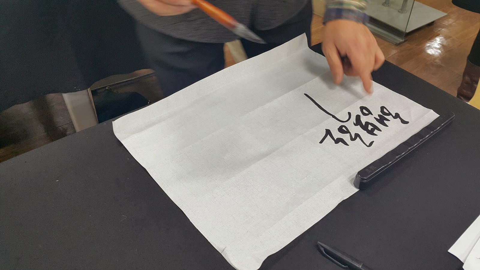 The italicized Korean calligraphy style.