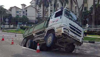 http://sciencythoughts.blogspot.co.uk/2014/04/truck-swallowed-by-singapore-sinkhole.html