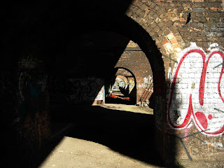 <img src="Arches near the A57 Inner Ring Rd, Salford.jpeg" alt="urban photography, old buildings, railway arches">
