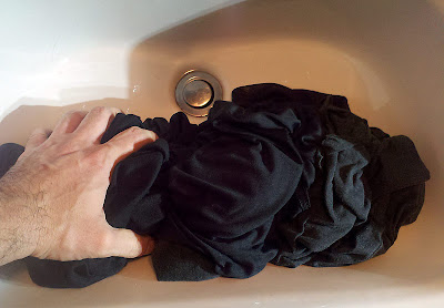 Squeeze out water from workout clothes before rinising