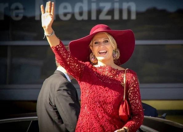 Queen Maxima wore Natan red lace dress and red Natan pumps for Völklinger Ironworks and University Medical Centre visit